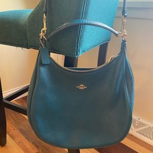 Coach Teal Pebbled Leather Crossbody bag.